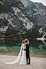 bride and groom kissing in their first look- Dolomites Elopement