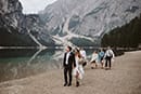 bride and groom walking and admiring the beautiful nature surrounding them- Dolomites Elopement