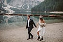 bride and groom walking in the middle of Italian beauty- Dolomites Elopement