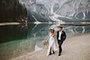 bride and groom walking in the wonders of Italy Dolomites- Dolomites Elopement