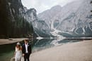 bride and groom walking in the middle of Dolomites- Dolomites Elopement
