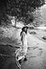 bride looking back and walking in the middle of the road- Dolomites Elopement