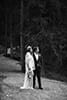 bride and groom looking at the wonders of Italy- Dolomites Elopement