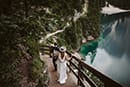 bride and groom walking in the trail of Dolomites- Dolomites Elopement