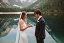 bride reading her wedding vow to the groom- Dolomites Elopement