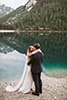 bride and groom hugging and happily in the moment- Dolomites Elopement