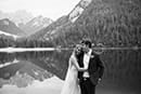 bride and groom happily in the moment in black and white- Dolomites Elopement