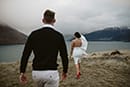 bride and groom walking in the wonders of nature- Queenstown Wedding