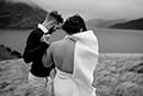 bride and groom walking in the midst of nature- Queenstown Wedding