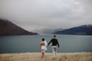 bride and groom walking together- Queenstown Wedding