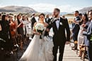 bride and groom walking down the aisle- Queenstown Wedding