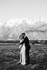 bride and groom hugging in the middle of the mountain- Queenstown Wedding