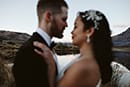 bride and groom admiring each other in the midst of the beautiful mountain- Queenstown Wedding