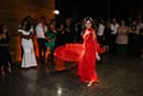 bride in her red gown dancing at her wedding party- Queenstown Wedding