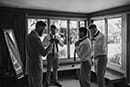 groom getting ready with his groomsmen- Taupo Wedding