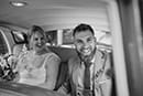 bride and groom in their bridal car happily in the moment- Taupo Wedding