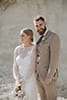 bride and groom in the middle of fine big rock- Taupo Wedding