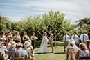 bride and groom in their outdoor wedding ceremony- Taupo Wedding