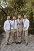groom with his groomsmen happily in the moment- Taupo Wedding