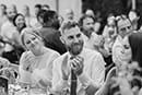 bride and groom in black and white shot of having fun in their wedding reception- Taupo Wedding