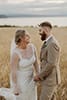 bride and groom laughing and enjoying their moment as the sun starts to set- Taupo Wedding